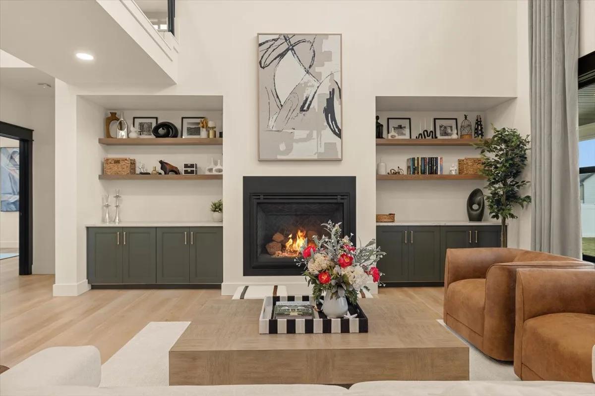 Living room fireplace with Shade Grown built-in cabinets and Rustic Beech shelves from the American Collection