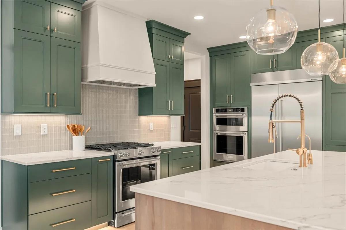Wynnbrooke American Collection kitchen with Shade Grown perimeter cabinets and a Rustic Beech island by Kitchens Plus MT