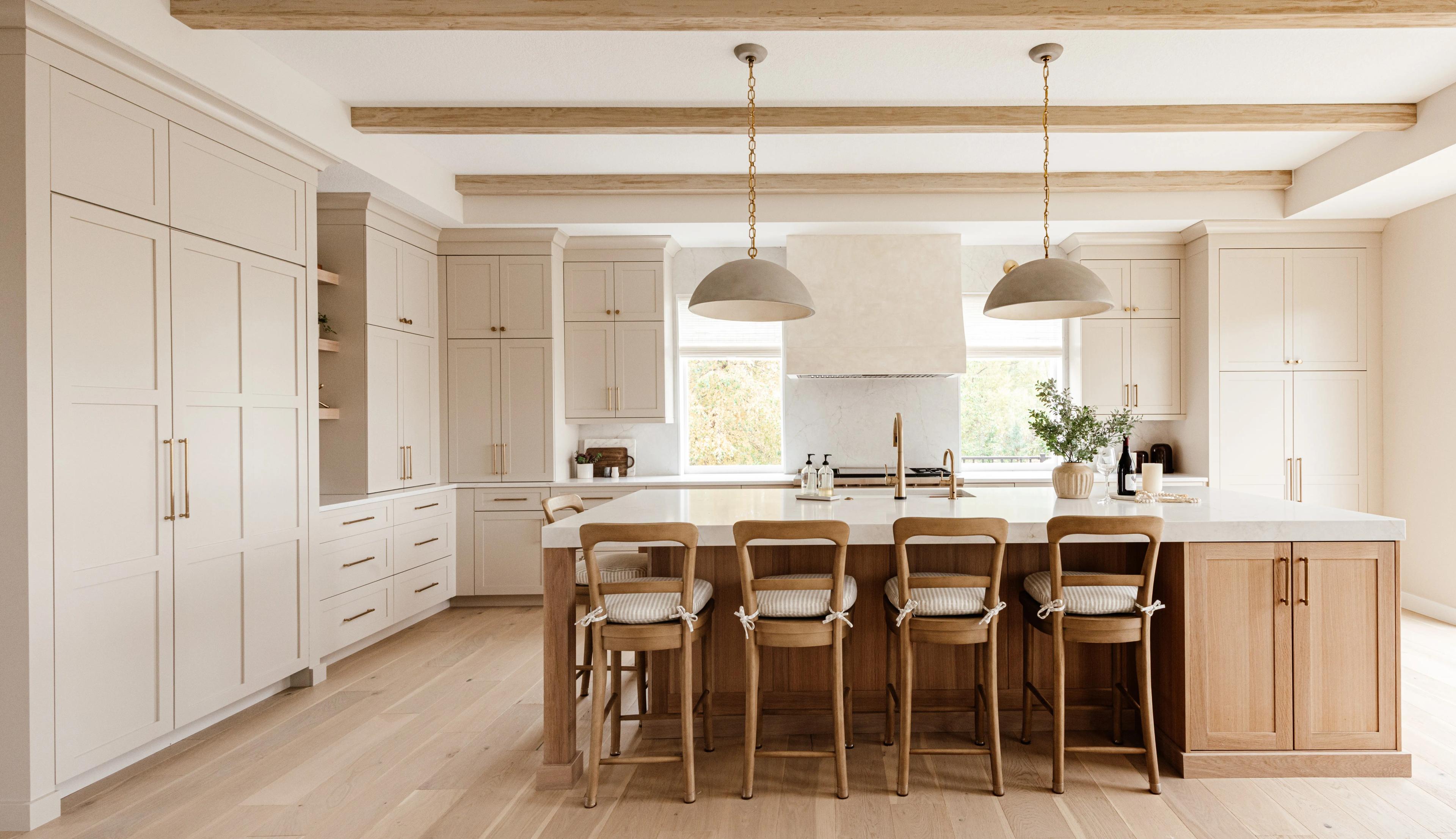 Wynnbrooke American Collection kitchen with Plateau cabinets in Accessible Beige and a White Oak island in Sand stain by Revival House Design